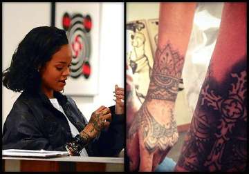 inked again rihanna gets her 21st tattoo view her tattoo collection