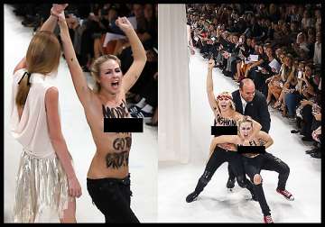 supermodel punches topless protestor at paris fashion week see pics