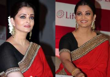 aishwarya rai bachchan shows off her mommy style in sabyasachi sari see pics