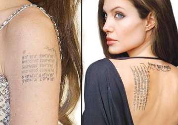 angelina jolie s kids drawn to her tattoos