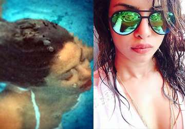 priyanka chopra takes a dip in pool to cool off see pics