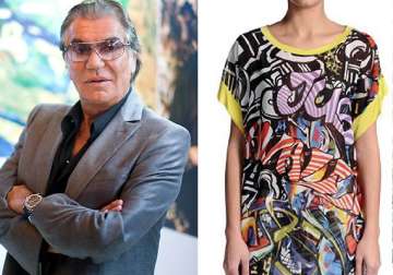 designer roberto cavalli sued for copying street artist s graffiti work