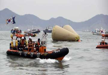 all 15 crew members of ill fated south korean ferry held