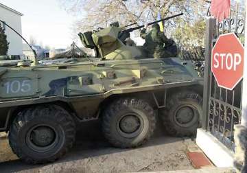 armoured vehicles enter ukrainian town