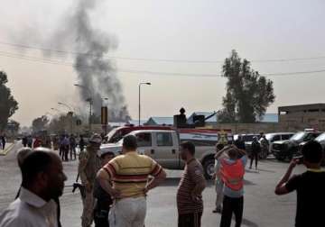 attackers kill 22 in coordinated baghdad assault