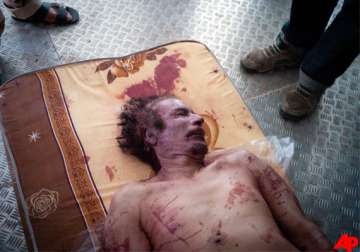 autopsy done on muammar gaddafi s body