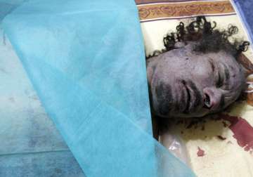 autopsy report says gaddafi killed by shot to head