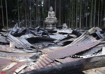bangladeshi muslims torch buddhist temples homes