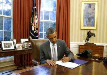 barak obama signs veterans health care bill into law