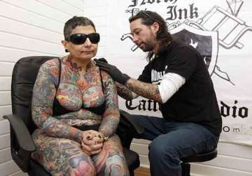 blind woman in wales spends 416 hours to get tattooed but won t be able to see