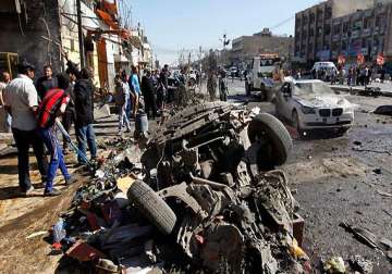bombings kill 48 in south and central iraq