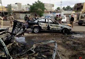 car bombs and roadside bombings kill 21 in iraq