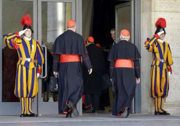 cardinals begin pre conclave meetings amid scandal