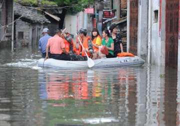 china rains leave one dead 15 missing