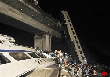 china bullet train derails coaches fall off bridge