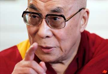 china warns dalai lama on reincarnation process