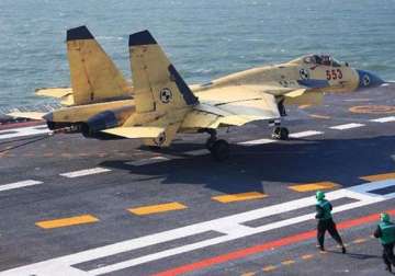 china must develop larger aircraft carriers says expert