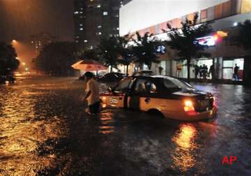 china storms kill 20 including 10 in beijing