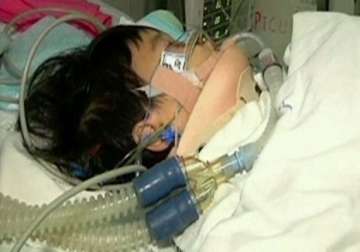 chinese girl who fell 10 storeys wakes up from coma