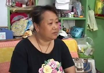 chinese mother marches to save son s life