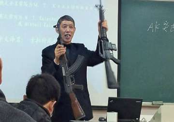 chinese teacher carries guns to class creates online buzz