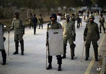 clashes at cleric s march in islamabad