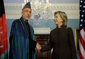 clinton meets visiting afghan president karzai