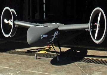 darpa building an aircraft that hovers like a helicopter but flies like a plane