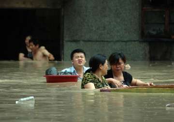 death toll in china floods rises to over 100