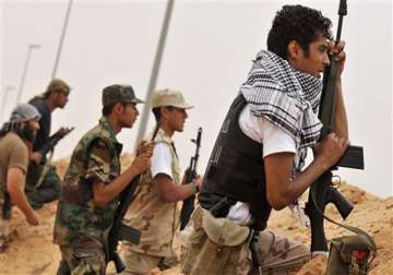 deaths mount as anti gaddafi fighters inch forward