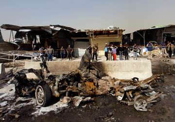 dozens killed in serial blasts in baghdad