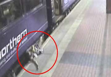 drunk woman falls into gap between a train and the platform