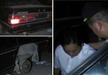 drunk driver in china sleeps inside car wheel number plate stolen