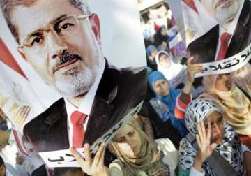 egypt questions brotherhood s top leader in prison