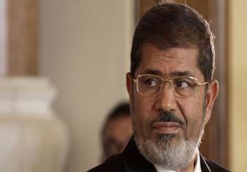 egypt unrest morsi adamant says he will protect constitutional legitimacy with his life