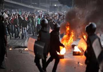 egypt unrest interim president meets army chief 36 killed in violence