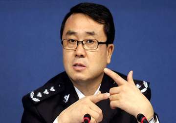 ex top cop in china scandal jailed for 15 years