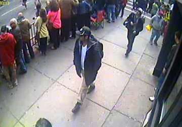 fbi releases pictures and videos of two boston bomb suspects