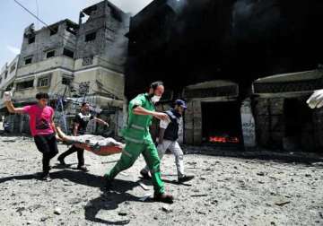 israel presses blistering attack on gaza toll rises to 524