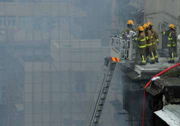 firefighters battle deadly blaze in market