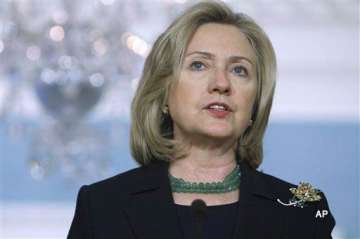 gaddafi forces pushed back but remain a threat clinton