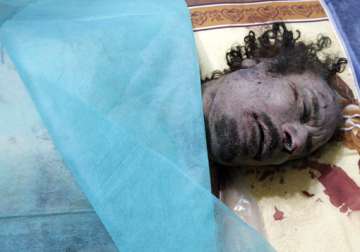 gaddafi s daughter demands icc probe into father s death