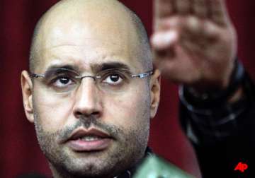 gaddafi s son seif al islam arrested icc prosecutor