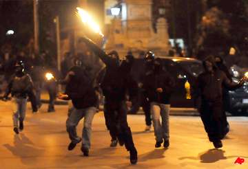 greek protesters clash with police