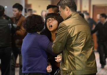 grief lingers as search for lost jet continues