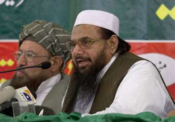 hafiz saeed wants india to be declared a terrorist state rss demands shinde s removal