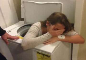 hilarious girl stuck in washing machine while playing hide and seek