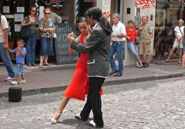hundreds of couples tango on streets of buenos aires