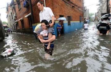 147 killed as heavy rains pound china