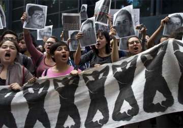 missing students supporters attack office of mexico s ruling party